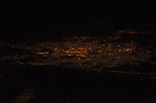 Night shot of Baghdad from a distance of approx. 150 km