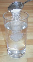 If common salt and water are mixed, the sodium and chloride ions are dissolved in the water, i.e. separated from each other and individually surrounded by water molecules.