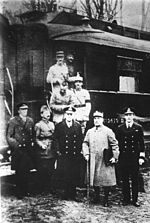 Marshal Foch (second from right) and his delegation in front of the Compiègne carriage after the signing of the armistice