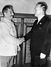 Stalin and Ribbentrop's handshake after the signing of the Hitler-Stalin Pact, Moscow, August 24, 1939.