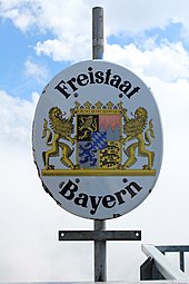 The border sign of the Free State of Bavaria to Tyrol on the Zugspitze.