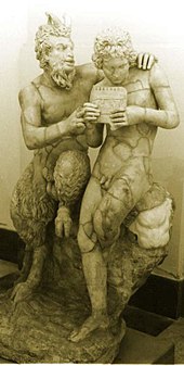 Patung Pan yang sedang mengajari Daphnis memainkan pipa (c. 100 SM).