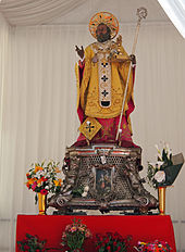 Statue of St. Nicholas after the procession in Ferrarese Square in Bari