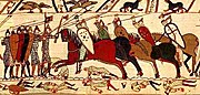 Deel van het Tapijt van Bayeux waarop de Slag bij Hastings is afgebeeld, die plaatsvond op 14 oktober 1066.