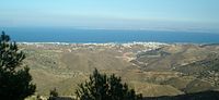 Staden Chios från kullarna  