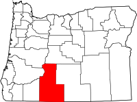 Een kaart van de provincies in de staat Oregon. Klamath County is in het rood.
