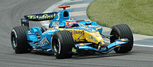 Fernando Alonso die zich kwalificeert in een Renault Formule 1-auto tijdens de Grand Prix van 2005 in de Verenigde Staten.
