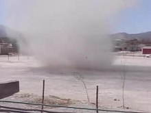 Play media file Video recording: A dust devil emerges and grows (Mexico)