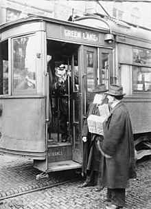 During the Spanish flu in 1918, a streetcar conductor in Seattle turns away a person trying to board without wearing a mask