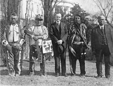 U.S. President Calvin Coolidge with four Osage Indians after signing the Indian Citizenship Act (1924).