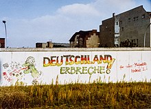 Graffiti directed against Helmut Kohl and reunification in the former death strip Mühlenstraße, 2 October 1990