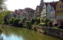 View of the Neckar in Tübingen and the silhouette of the old town of Tübingen with the Hölderlin Tower