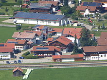 Various roofs with photovoltaic systems in Oberstdorf