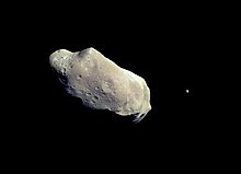Asteroid (243) Ida with moon Dactyl, photographed from the Galileo spacecraft