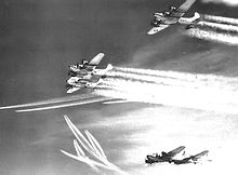 US bomber over Austria, 1944. Vapour trails could be seen in large numbers in the sky even then.