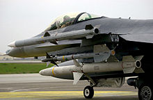 An AGM-88 HARM (bottom) next to an AIM-9 (middle) and AIM-120 (top) on an F-16C