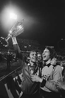 Willi Reimann (left) and Rudolf Kargus (right) with the cup after the final victory against RSC Anderlecht in the European Cup Winners' Cup, 11 May 1977