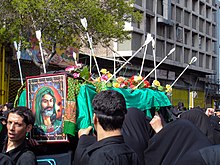 Picture of Hussein with symbolic coffin at Arbain festival in Mashhad