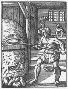 Bager sætter brød ind i en ovn, 1568