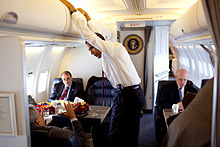 Then US President Barack Obama on Air Force One with his BlackBerry in a holster