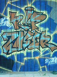 Graffito on a construction fence