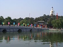 Bridge in Beihai Park - In the background a white pagoda