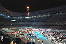 Atleten verzamelen zich in het stadion tijdens de sluitingsceremonie van de Olympische Zomerspelen 2008  