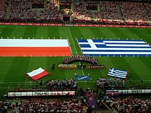 Partido inaugural, Polonia contra Grecia  