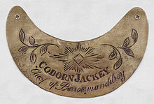 Placa de latón presentada al líder aborigen Coborn Jackey de la tribu Burrowmunditory por el primer colono James White. La placa se conserva en el museo de Young.  
