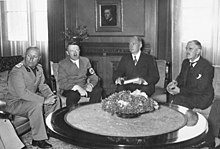 Munich Conference on 29 September 1938 in the Führerbau on Königsplatz in Munich, from left to right: Mussolini, Hitler, interpreter Paul Otto G. Schmidt, Chamberlain