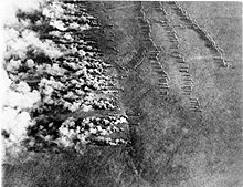 Gas attack by the blowing method, infantry on the right side of the picture is ready for the following attack