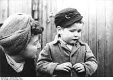Woman with orphan boy , Berlin 1945