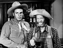 Crabbe met Al "Fuzzy" St. John, zijn sidekick in de "Billy" westerns...