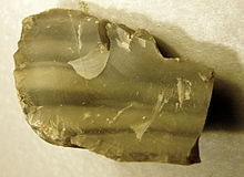 Banded flint from North German boulder. The bands go back to a rhythmic silicification during the formation of the flint.