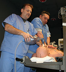 Resuscitation training on a dummy