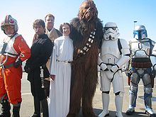 Fans in costumes of various Star Wars characters.