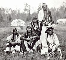 Historical photo of a group of Chippewa men from the Bad River