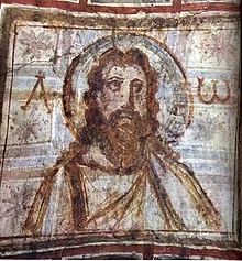 Risalente alla Roma del IV secolo, questa è la più antica immagine conosciuta di Gesù che lo mostra come un uomo semitico barbuto, piuttosto che un romano rasato e con i capelli corti.