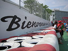 Sloganet Bienvenue au Québec på Wall of Champions