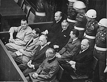 Eight of the 24 main defendants in Nuremberg: Göring, Hess, von Ribbentrop, Keitel (front row from left), Dönitz, Raeder, von Schirach, and Sauckel (behind).