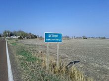 De flesta orörda samhällen i Kansas är markerade med en vägskylt.  
