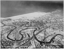 Downtown Cleveland in 1937, with the Flats in front and the Great Lakes Exposition grounds in back.