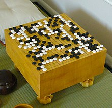 围棋。发明于中国，传到韩国和日本。