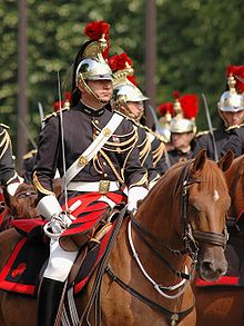 Republikánská garda během průvodu dobytí Bastily v roce 2011.  