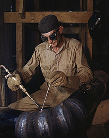 Joining two tubes by oxyacetylene welding with filler wire, 1942