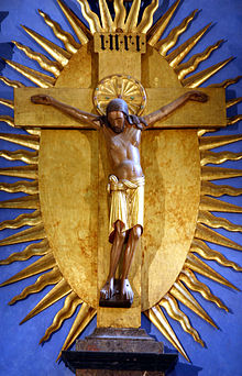 Krucifixet, ett kors med corpus. Det är en symbol som används av den katolska kyrkan samt inom lutheranismen, den östliga ortodoxin och anglikanismen.  