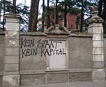 Anti-capitalist graffito in Bolzano