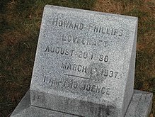 Lovecraft's tombstone, inscribed "I AM PROVIDENCE."