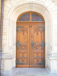 Wooden door on the side portal of the protestant Christuskirche in Heidelberg