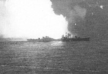 The destroyer Akizuki explodes off Cape Engaño
